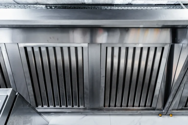 Certified Best Wash crew servicing a commercial kitchen ventilation system
