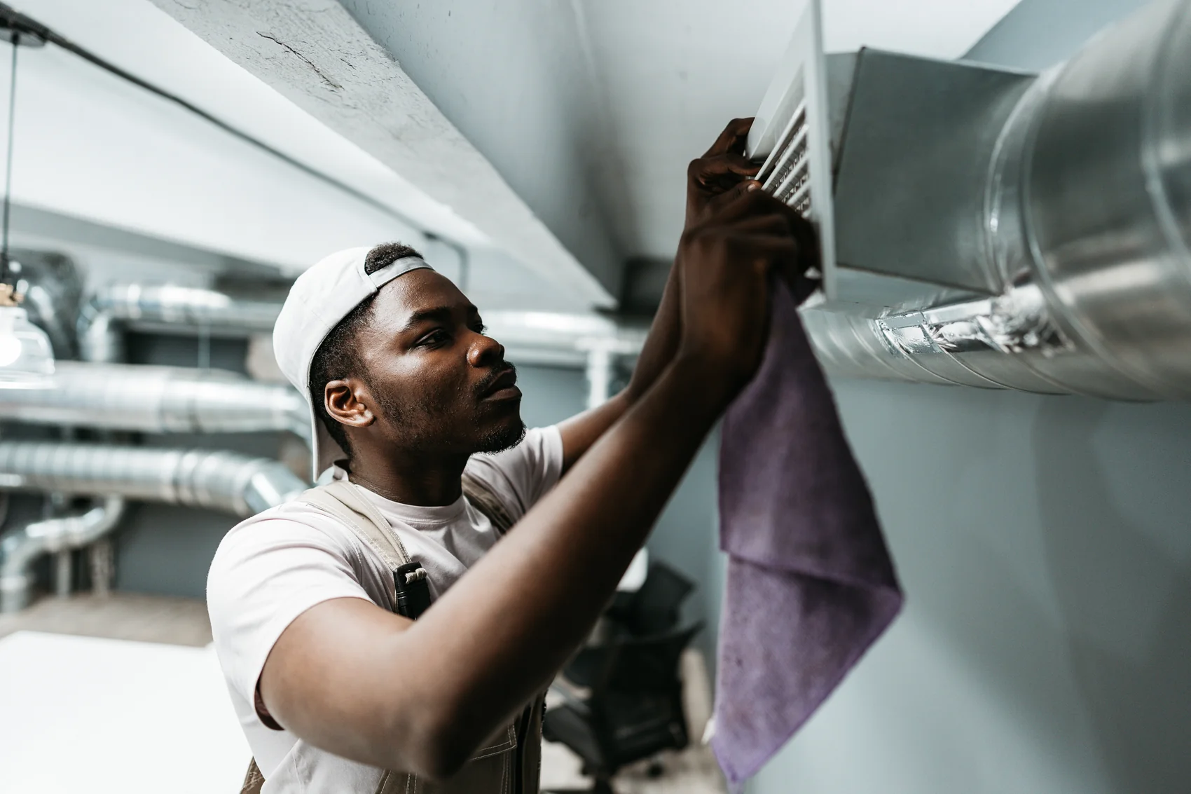 Restaurant hood cleaning of kitchen exhaust ductwork